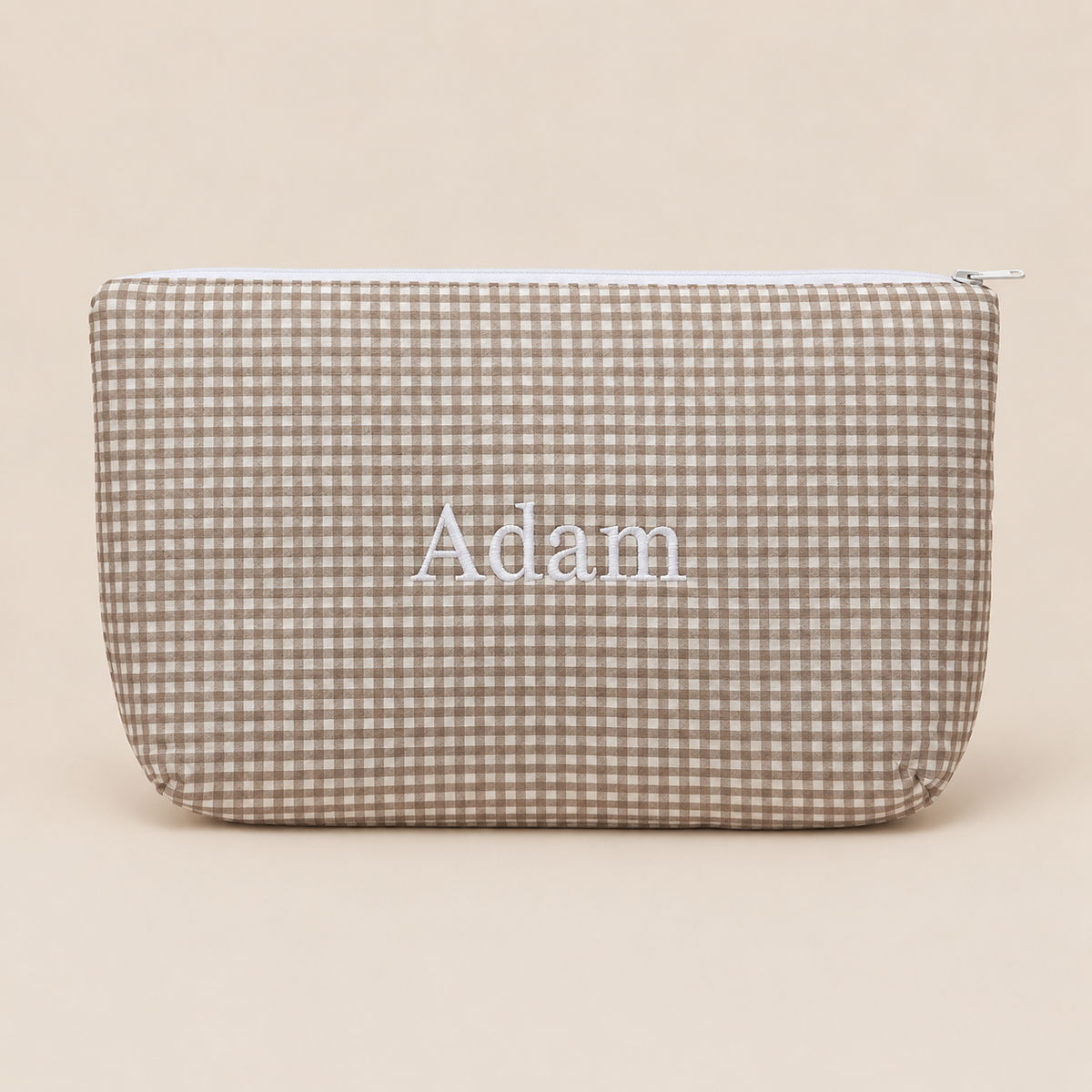 Trousse de toilette bébé en vichy taupe brodée au prénom
