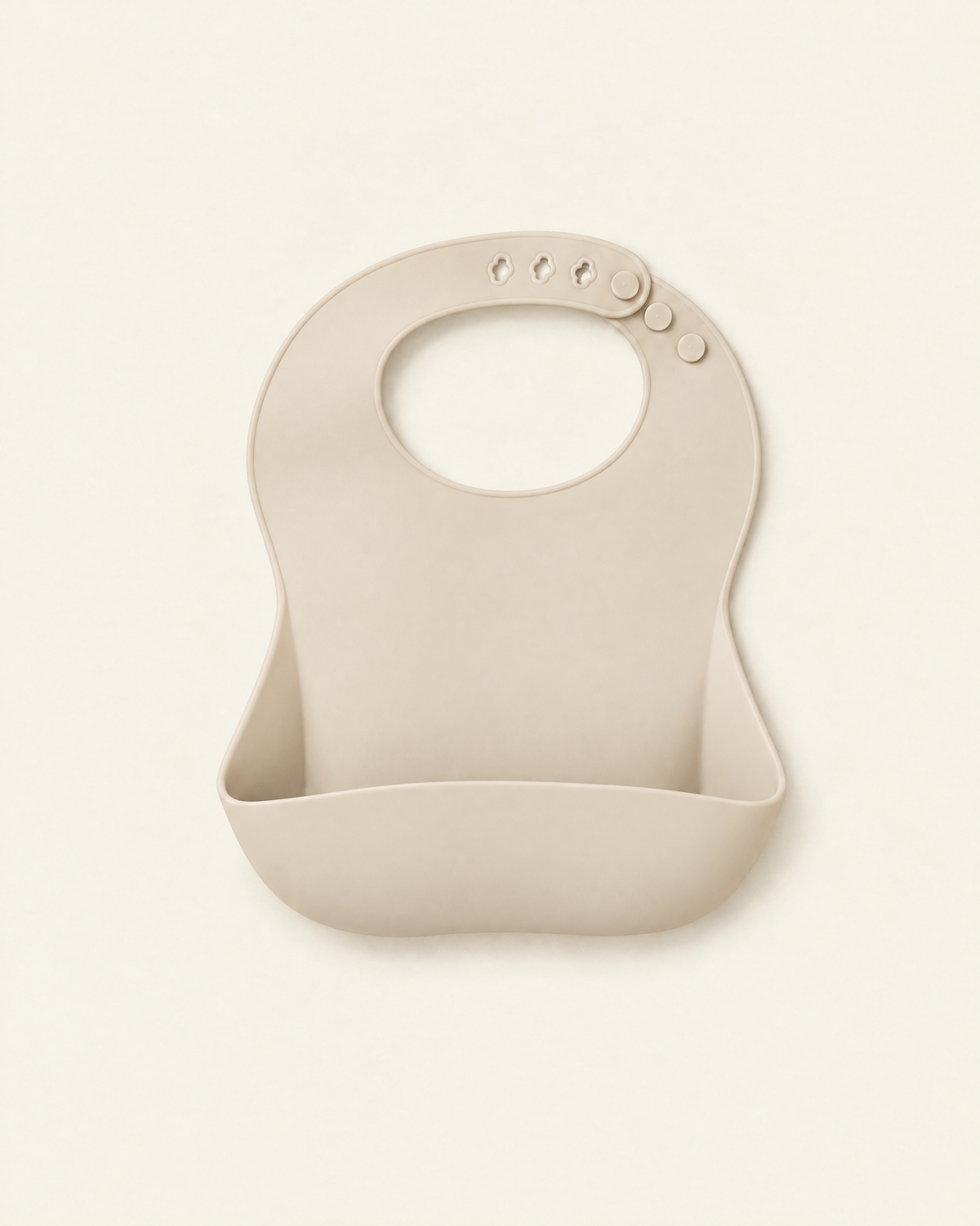 Bavoir en silicone à poche crème